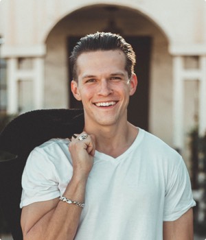 Man In White V Neck T Shirt And Black Pants 775358